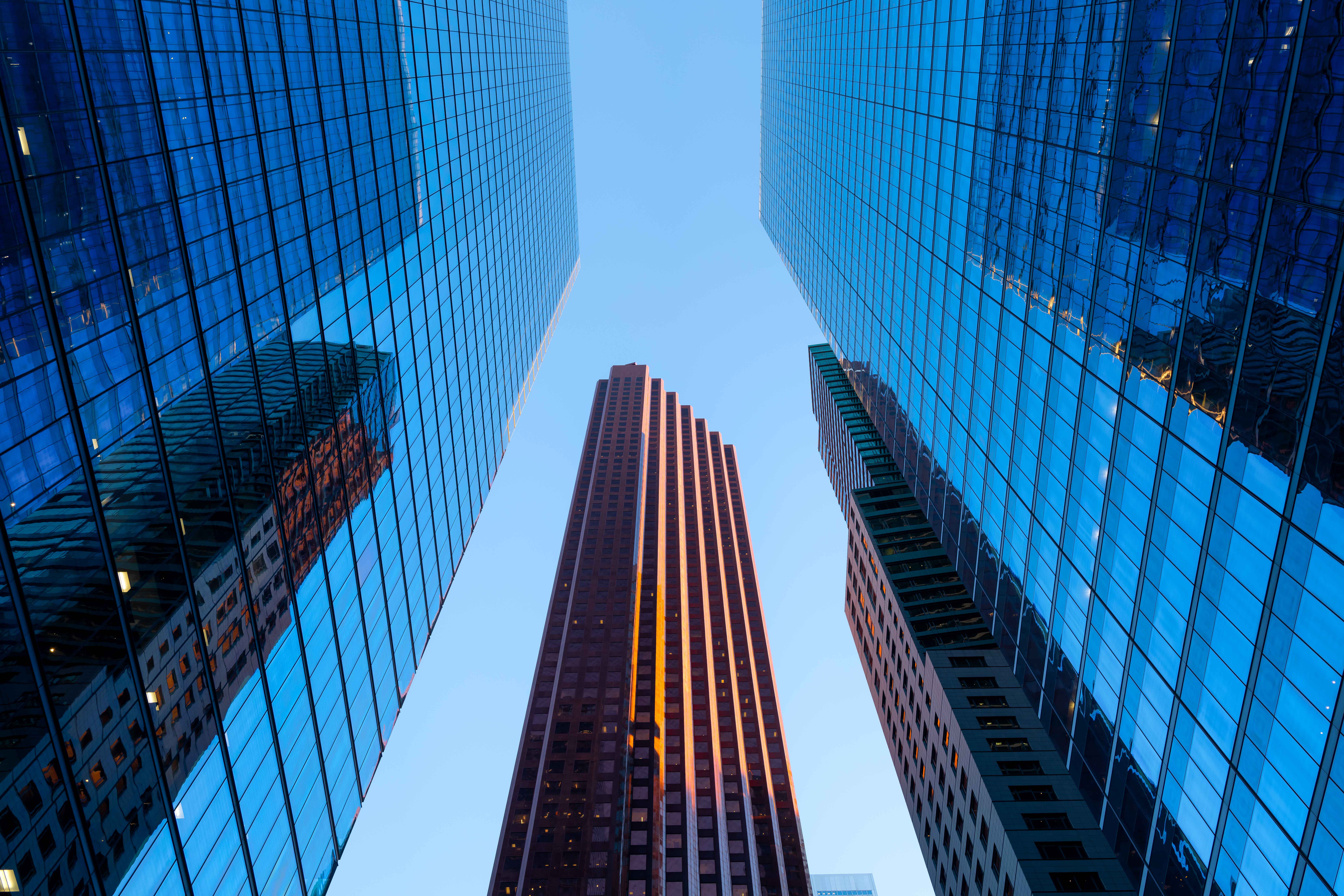 Real Estate. Financial Center. High office buildings in the business center of the city. Glass and steel. Skyscrapers as a background.